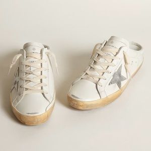 Super-Star Sabots in white leather with silver metallic leather star